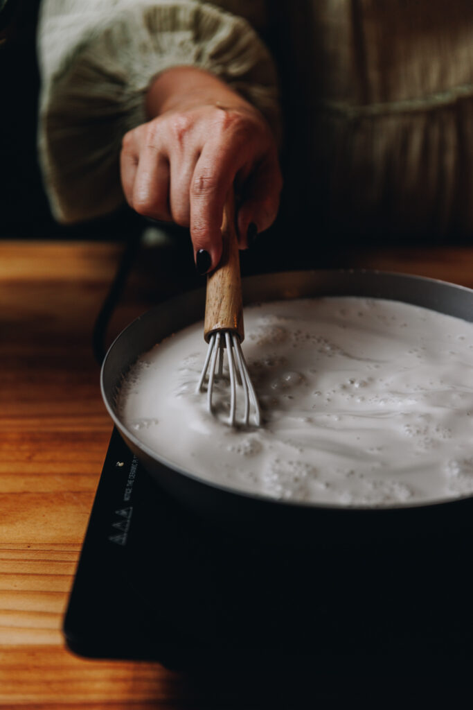 Simmer the coconut sauce