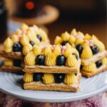 simple lemon custard and is piped on to two layers of pastry with blueberries in between each one.