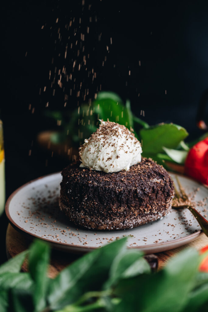 Grate over chocolate and top with cream