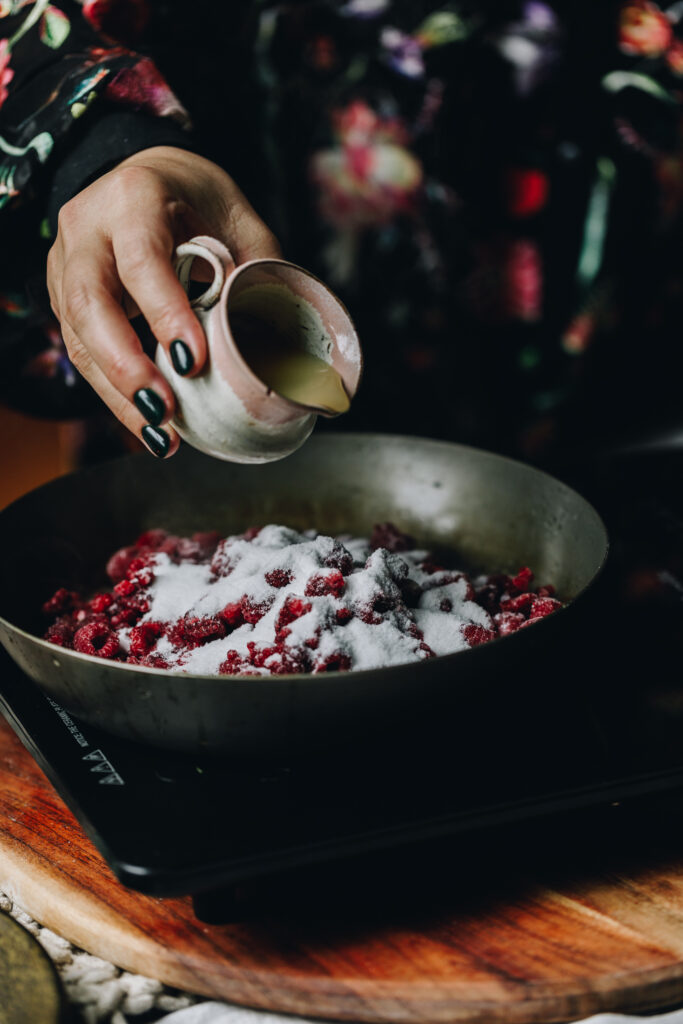 Add the lemon juice to the raspberries 