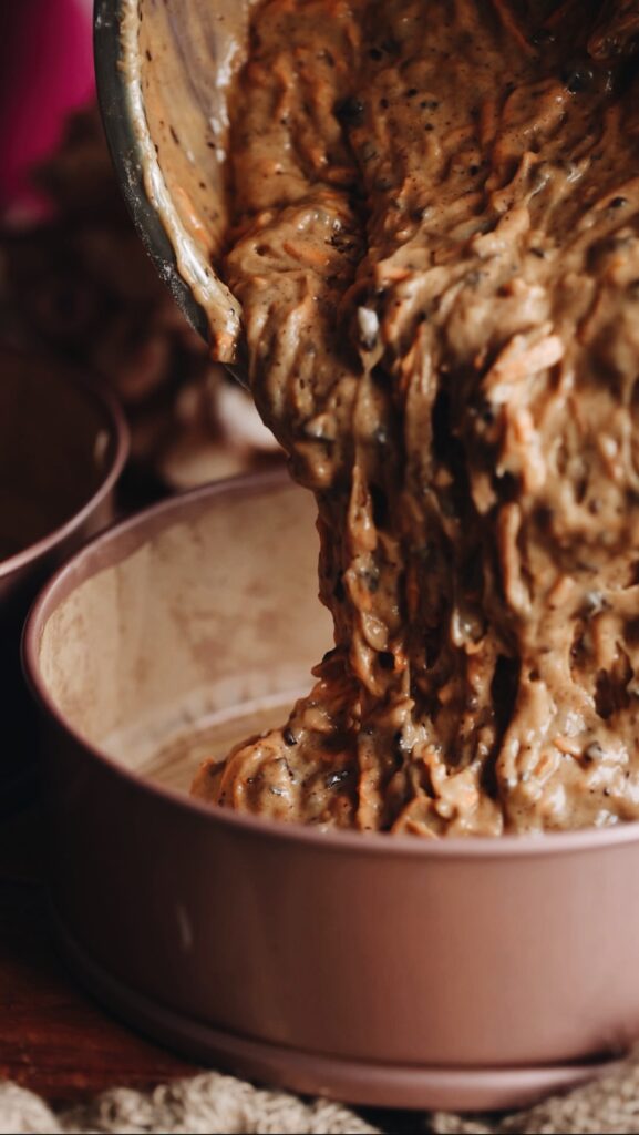 Add the mixture in to two cake tins