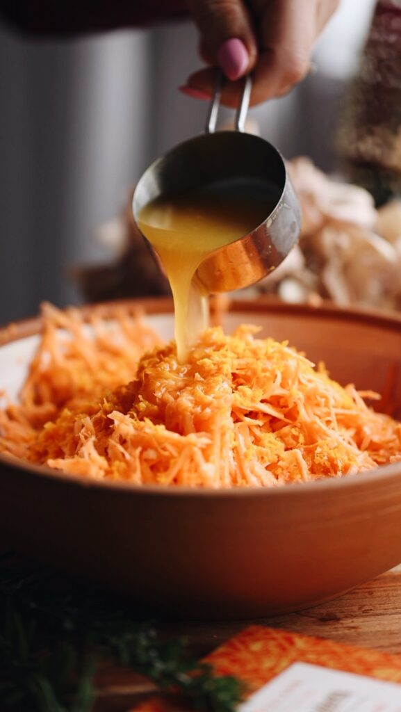 Orange juice and grated carrots
