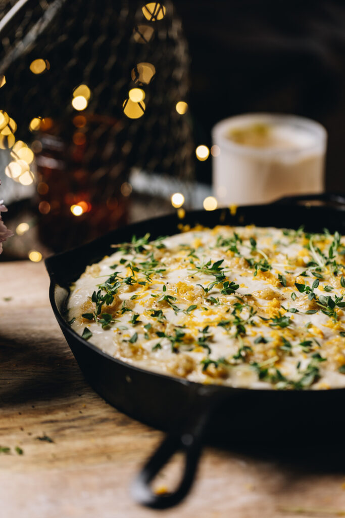 Add thyme, lemon and garlic to the dough