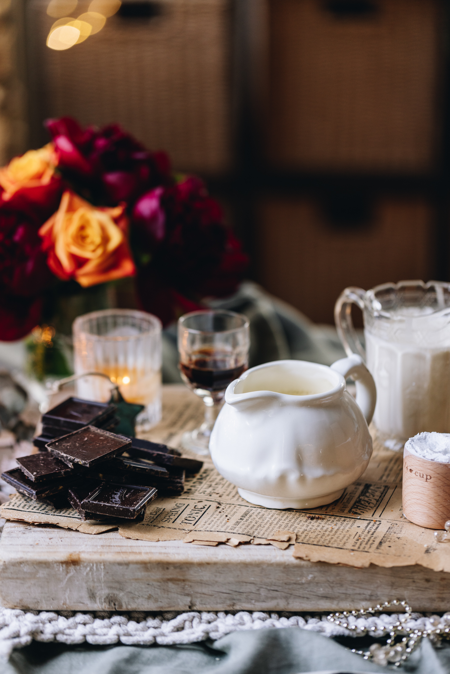 Chocolate Mousse and Caramel Dessert ingredients are in different vintage bowls and are sitting on a wooden board.