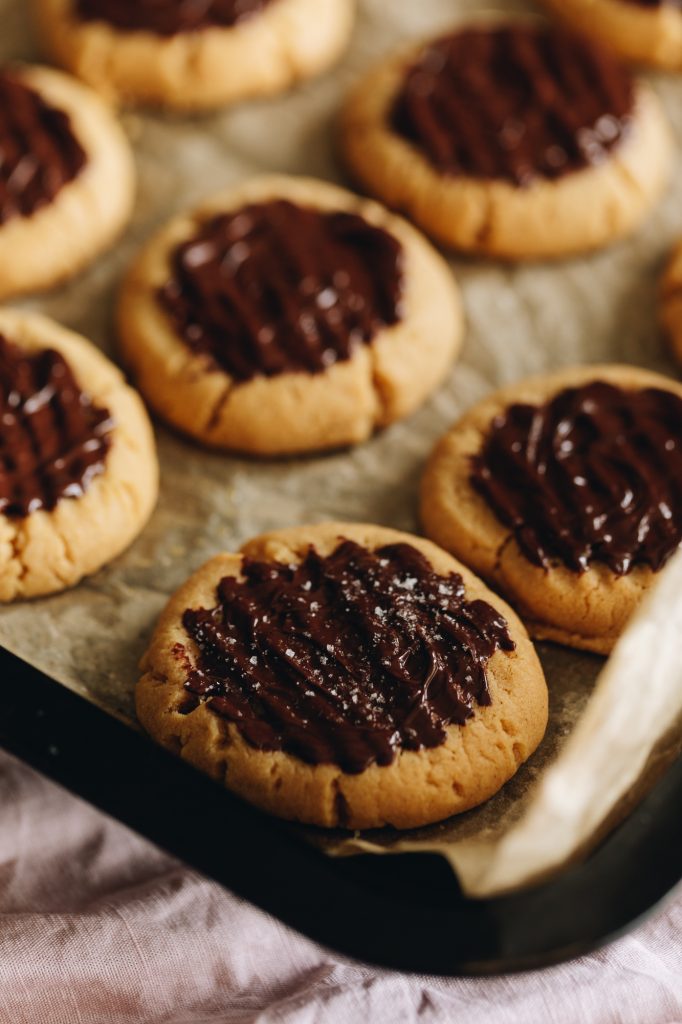 Add the chocolate and sea salt on top of the biscuits
