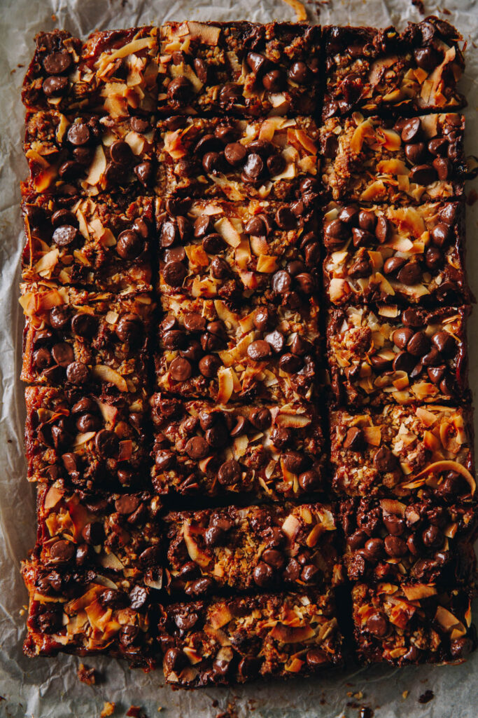 A flay shot of the Best Oaty Caramel Slice that has been baked and sliced. 