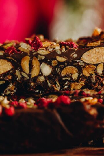 Close up of the textures inside a chocolate nut and seed slice