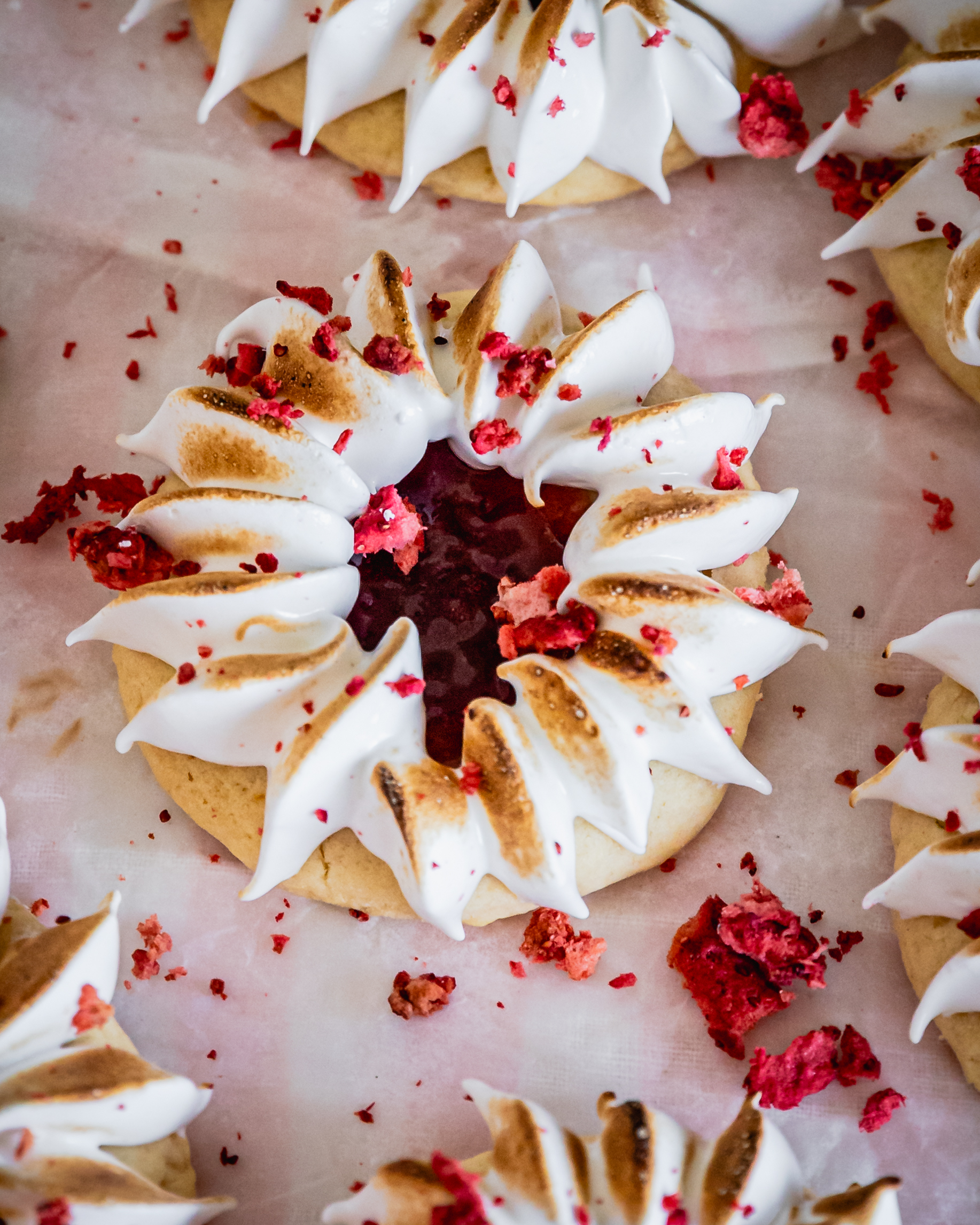 Close up of a decorated strawberry jam drop.