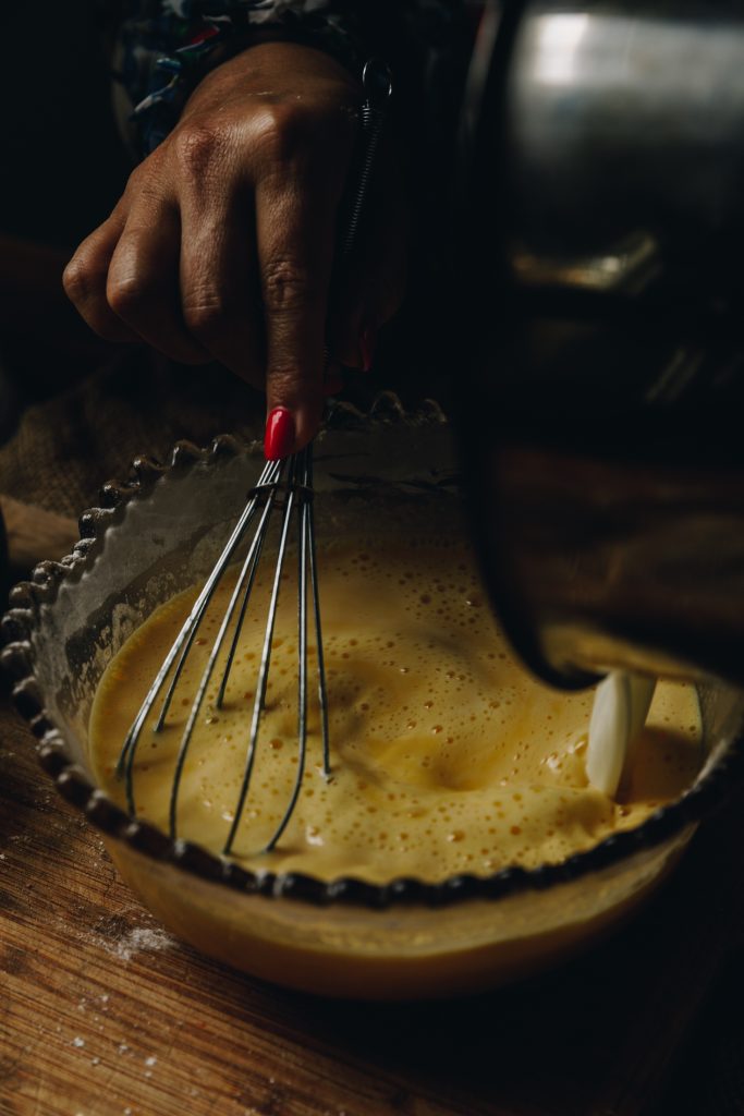 Cream poured in to custard