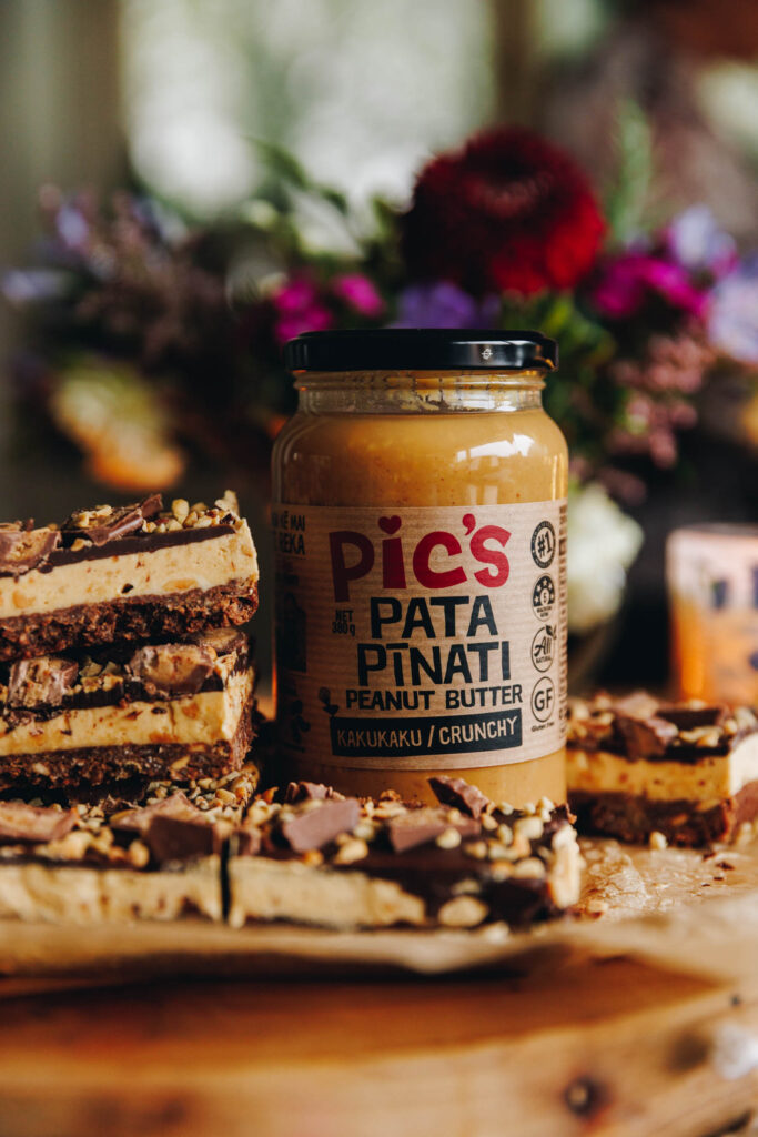 A final shot of some of the Peanut Butter Weetbix Slice that has been edged up to the Pic's Pata Pīnati kakukaku jar that was celebrated in this recipe.